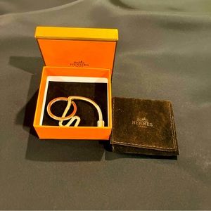 Brand new Hermes key ring with original package, never used